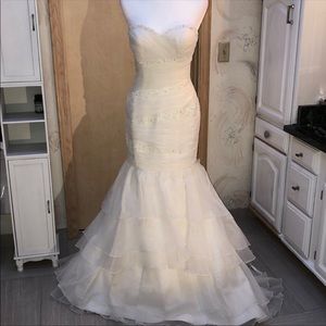 Ivory mermaid with beading and ruching.